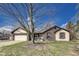 Charming brick home with a well-manicured lawn and inviting curb appeal at 7152 Sandalwood Dr, Avon, IN 46123