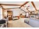 Open living area with a brick fireplace and seamless flow into other living spaces at 7152 Sandalwood Dr, Avon, IN 46123