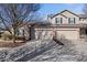 Charming home featuring a two-car garage, brick accents, and well-maintained landscaping at 7236 Wyatt Ln, Indianapolis, IN 46217