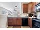 Well-appointed kitchen with ample counter space and view to adjacent living area at 7236 Wyatt Ln, Indianapolis, IN 46217