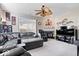 Inviting living room with neutral tones, leather sectional, and ample natural light at 7236 Wyatt Ln, Indianapolis, IN 46217