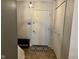 Functional entryway space with neutral tones, storage closet, and tiled floor at 7902 Benjamin Dr, Lawrence, IN 46226