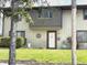 Charming townhome with a well-manicured lawn and inviting front entrance at 7902 Benjamin Dr, Lawrence, IN 46226