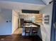 Bright kitchen featuring stainless steel appliances, breakfast bar and custom wood shelves at 7902 Benjamin Dr, Lawrence, IN 46226