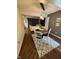 Open floor plan shows the dining and living rooms with comfortable seating at 7902 Benjamin Dr, Lawrence, IN 46226