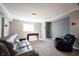 Cozy finished basement with a foosball table, comfortable seating, and a neutral color scheme at 9921 N Wind River Run, McCordsville, IN 46055
