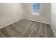 Bedroom featuring neutral carpet, a single window, and light grey walls at 10225 Bayton Ct, Indianapolis, IN 46229