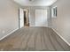 Neutral bedroom featuring gray walls, carpet, closet, and natural light through a window at 10225 Bayton Ct, Indianapolis, IN 46229