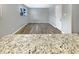 An empty room, with grey walls, hardwood floors, and a window to the outside at 10225 Bayton Ct, Indianapolis, IN 46229