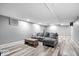 Spacious basement with modern flooring and plenty of room for entertaining guests at 10249 Southwind Dr, Indianapolis, IN 46256