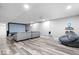 Finished basement featuring a projector screen, and cozy seating area at 10249 Southwind Dr, Indianapolis, IN 46256