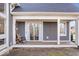 Covered patio with seating area, providing a relaxing outdoor space at 10249 Southwind Dr, Indianapolis, IN 46256