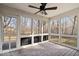 Spacious sunroom with multiple large windows, offering an abundance of natural light at 10249 Southwind Dr, Indianapolis, IN 46256