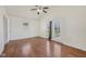 Bedroom showcasing hardwood floors, natural light from a window, and a vaulted ceiling at 1039 S Ohio St, Martinsville, IN 46151