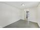 Bedroom with white walls and freshly painted floors at 1039 S Ohio St, Martinsville, IN 46151