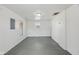 The living room features painted floors and ample natural light at 1039 S Ohio St, Martinsville, IN 46151