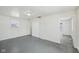 Bright living room with freshly painted walls and refinished hardwood floors at 1039 S Ohio St, Martinsville, IN 46151