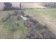 Aerial shot of land including a wooded area with a pond or river at 10624 N 200 W, Alexandria, IN 46001