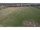 Aerial view of grass-covered acreage with a mixture of green and dormant grass at 10624 N 200 W, Alexandria, IN 46001