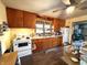 Functional kitchen features plenty of cabinets and a white appliance package at 10624 N 200 W, Alexandria, IN 46001