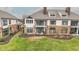 Scenic aerial of backyard with stone facade, and outdoor patio at 10744 Eldorado Cir, Noblesville, IN 46060