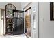 Beautiful foyer with neutral paint and dark wood door leading to exterior at 10744 Eldorado Cir, Noblesville, IN 46060