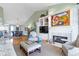 The living room opens up to the dining room and kitchen and features hardwood floors and neutral paint at 10744 Eldorado Cir, Noblesville, IN 46060