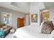 Comfortable main bedroom featuring neutral decor, a cozy sitting area, and a tranquil ambiance at 10744 Eldorado Cir, Noblesville, IN 46060