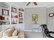 This well-lit office features built-in bookshelves, decorations and a comfortable chair at 10744 Eldorado Cir, Noblesville, IN 46060