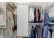 Organized walk-in closet with hanging racks, shelving, drawers and ample storage space for clothes and accessories at 10744 Eldorado Cir, Noblesville, IN 46060