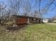 Charming brick home featuring a well-manicured lawn and stylish exterior at 110 Pleasant Run Dr, Markleville, IN 46056