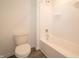 Clean bathroom featuring tile flooring, a toilet, and a shower/tub combo at 1265 Fleming Dr, Greenfield, IN 46140