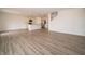 Spacious living room featuring hardwood floors, an island, and a modern kitchen at 1265 Fleming Dr, Greenfield, IN 46140