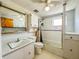 A full bathroom featuring a sink, toilet, cabinets and bath tub and shower at 1303 S D St, Elwood, IN 46036