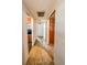 Hallway leading to other rooms, with interesting flooring at 1303 S D St, Elwood, IN 46036