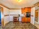 Kitchen featuring a corner eating area with built in oven at 1303 S D St, Elwood, IN 46036