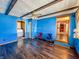 Spacious living room with blue walls and lots of natural light at 1303 S D St, Elwood, IN 46036