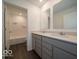 A bright bathroom features double vanity and modern fixtures at 1618 Trichel Dr, Greenwood, IN 46143