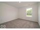 A simple bedroom with a neutral color scheme and natural light at 1618 Trichel Dr, Greenwood, IN 46143