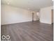 Large living area with hardwood floors and plenty of natural light at 1618 Trichel Dr, Greenwood, IN 46143