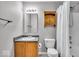 Functional bathroom features a shower-tub combo, vanity and integrated lighting at 2011 Blue Pine Ln, Indianapolis, IN 46231