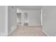 Bright bedroom with neutral carpet and light gray walls offers a blank canvas at 2011 Blue Pine Ln, Indianapolis, IN 46231