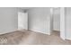Bedroom with an open closet featuring wire shelving, and neutral walls at 2011 Blue Pine Ln, Indianapolis, IN 46231