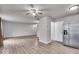 Spacious living room featuring hardwood floors and neutral paint at 2011 Blue Pine Ln, Indianapolis, IN 46231