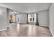 Bright living room featuring hardwood floors and ample natural light at 2011 Blue Pine Ln, Indianapolis, IN 46231