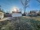 Spacious backyard showcasing detached garage at 2207 E Dudley Ave, Indianapolis, IN 46227