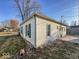 Well-maintained home exterior with neat vinyl siding and a tidy landscape at 2207 E Dudley Ave, Indianapolis, IN 46227