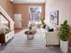 Cozy living room is staged with natural light, plush seating, and a striped rug at 2257 Grand Fir Dr, Greenwood, IN 46143
