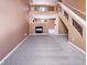 Inviting living room features a cozy fireplace and staircase to the second level at 2257 Grand Fir Dr, Greenwood, IN 46143