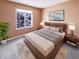 Relaxing main bedroom with a plush bed, decorative pillows, and soft, bright light at 2257 Grand Fir Dr, Greenwood, IN 46143